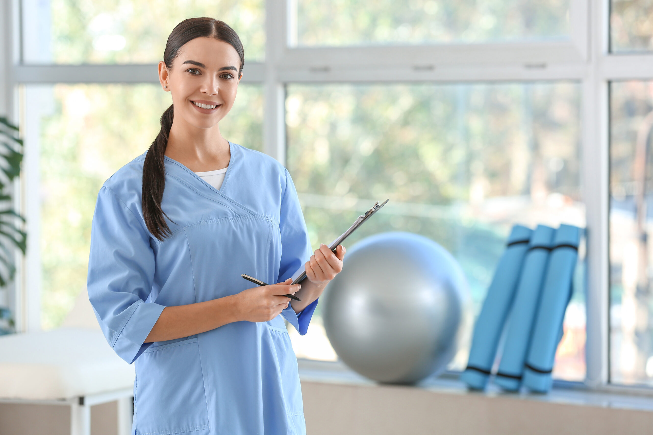 Female physiotherapist in rehabilitation center